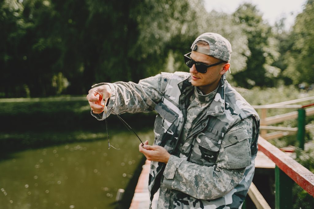 Man fishing and wearing sunglasses